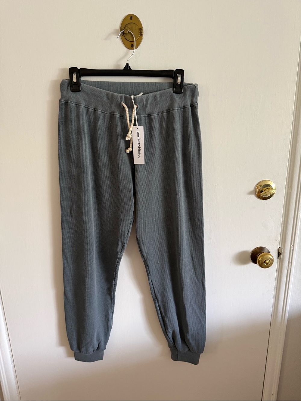 Perfect White Tees  Greyish Drawstring sweats. The fit is really nice.